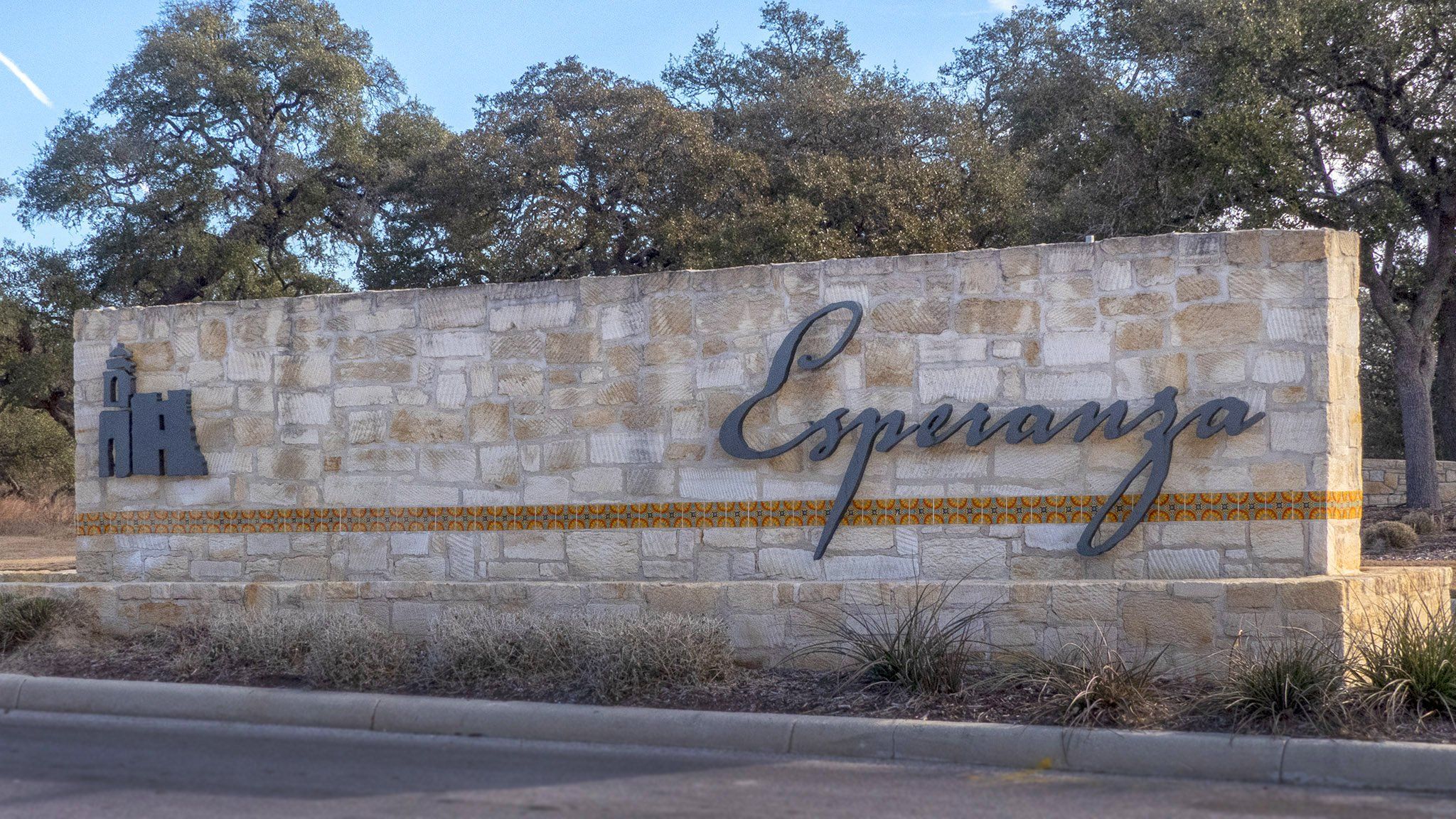 Entrance to the Esperanza community in Boerne, TX, featuring signage and landscaping (Image 1). Entrance to the Esperanza community in Boerne, TX, featuring signage and landscaping (Image 1).