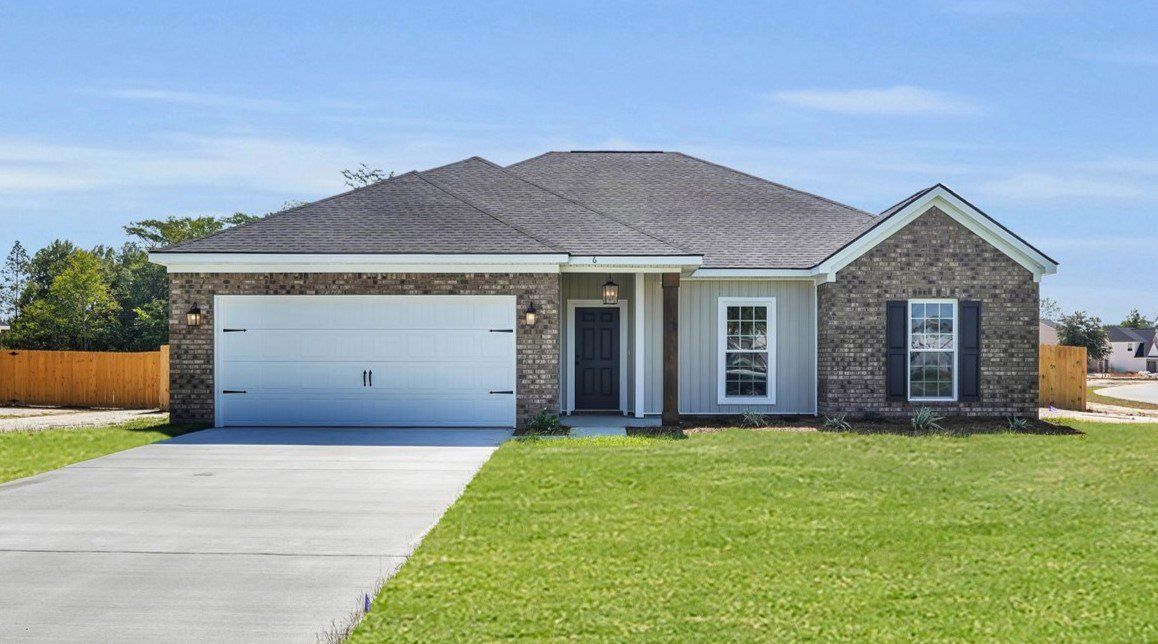 Front exterior of a home in the Doctor's Creek community, located in Ludowici, GA (Image 1).