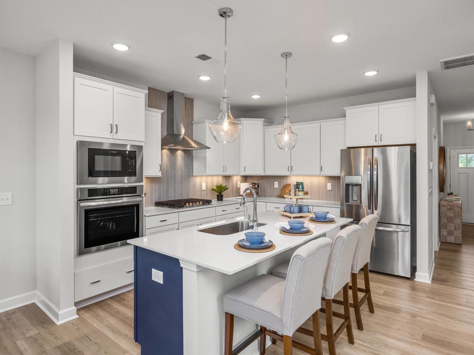 Furnished interior in a model home at Summers Walk in Davidson (Image 1).