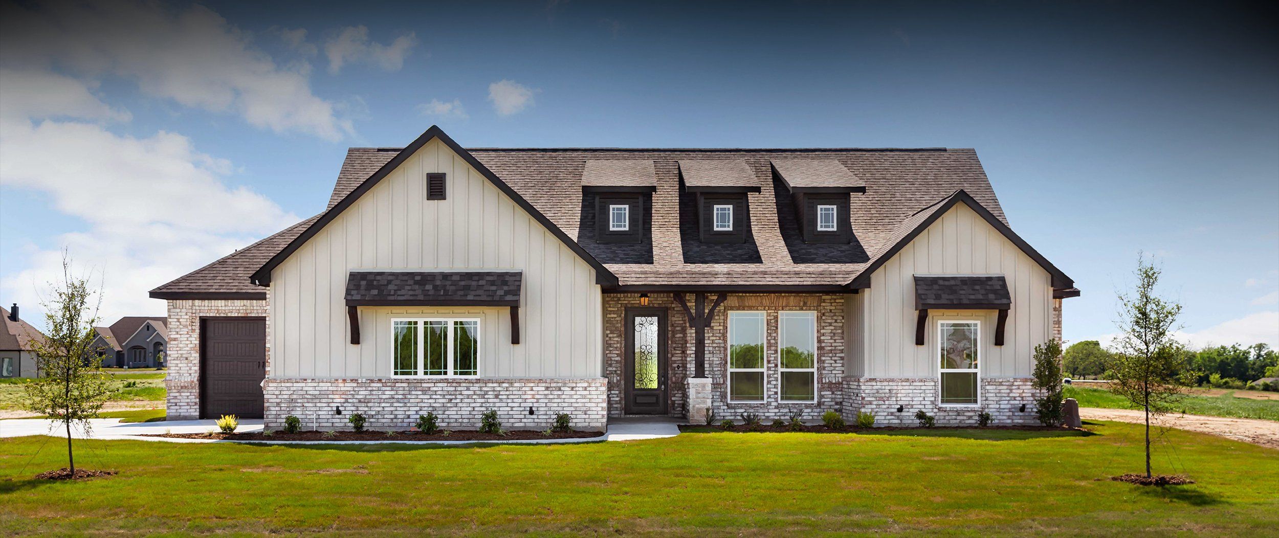 Front exterior of a home in the Bel Grand Estates community, located in Haslet, TX (Image 1).