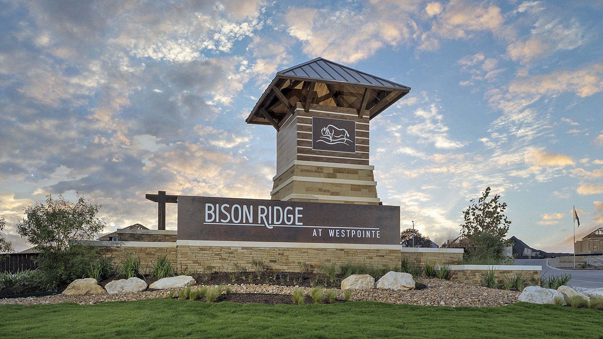 Entrance to the Bison Ridge community in San Antonio, TX, featuring signage and landscaping (Image 1). Entrance to the Bison Ridge community in San Antonio, TX, featuring signage and landscaping (Image 1).