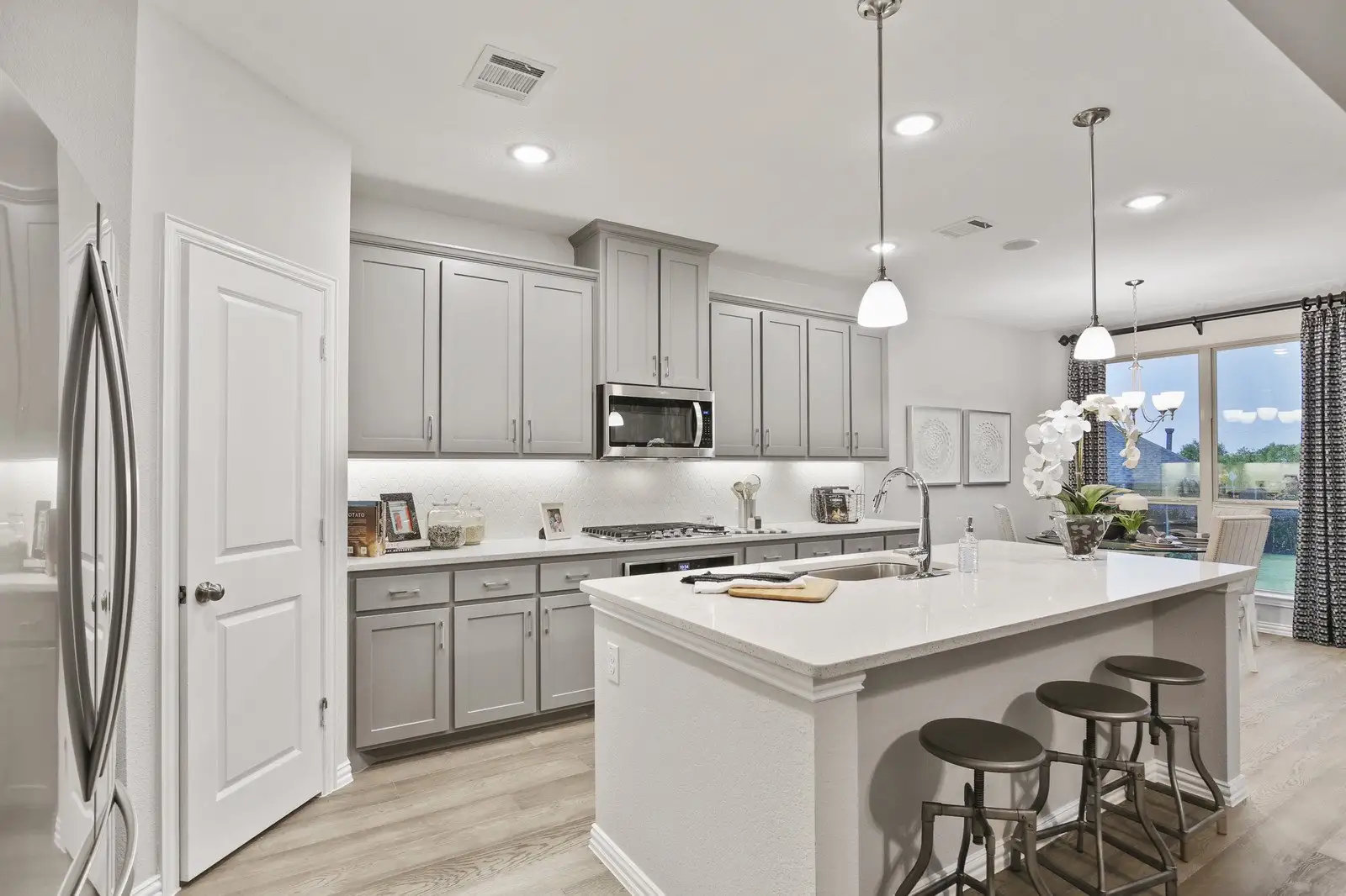 Furnished interior in a model home at Lakewood Village 50s in Lakewood Village (Image 1).
