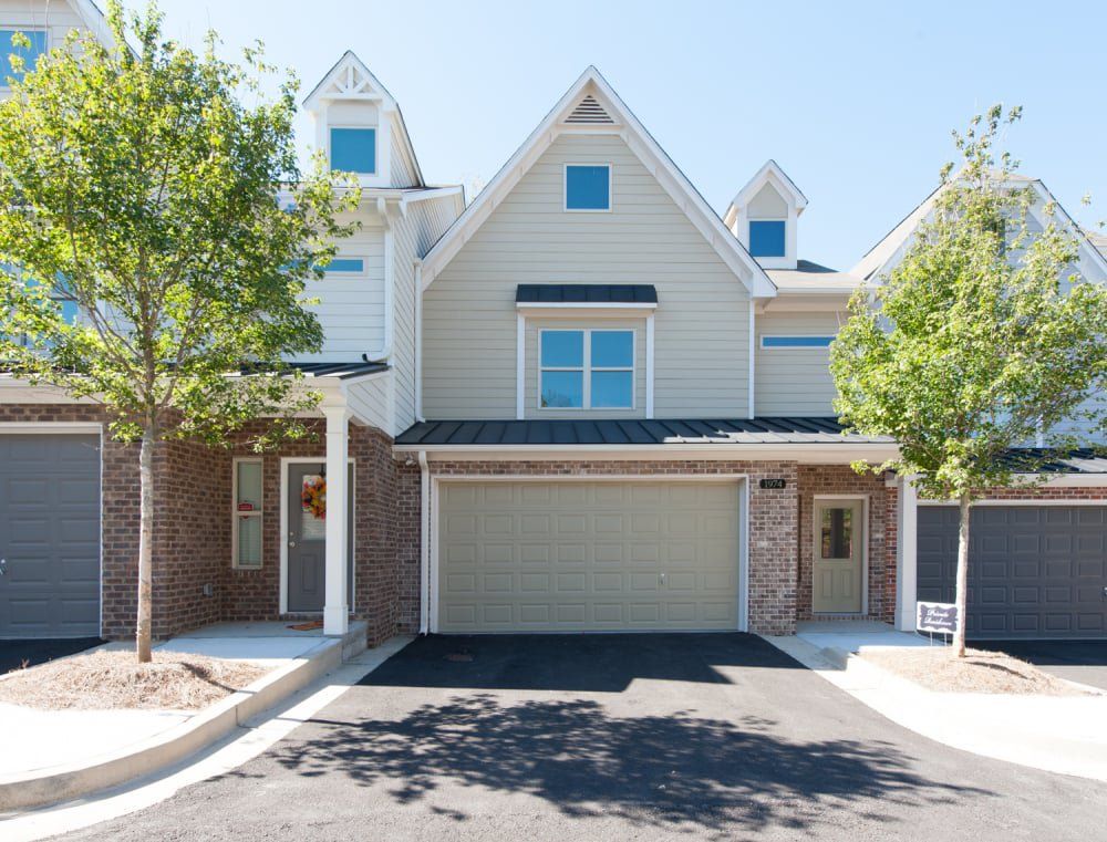 Front exterior of a home in the Riverside Park community, located in Atlanta, GA (Image 1).