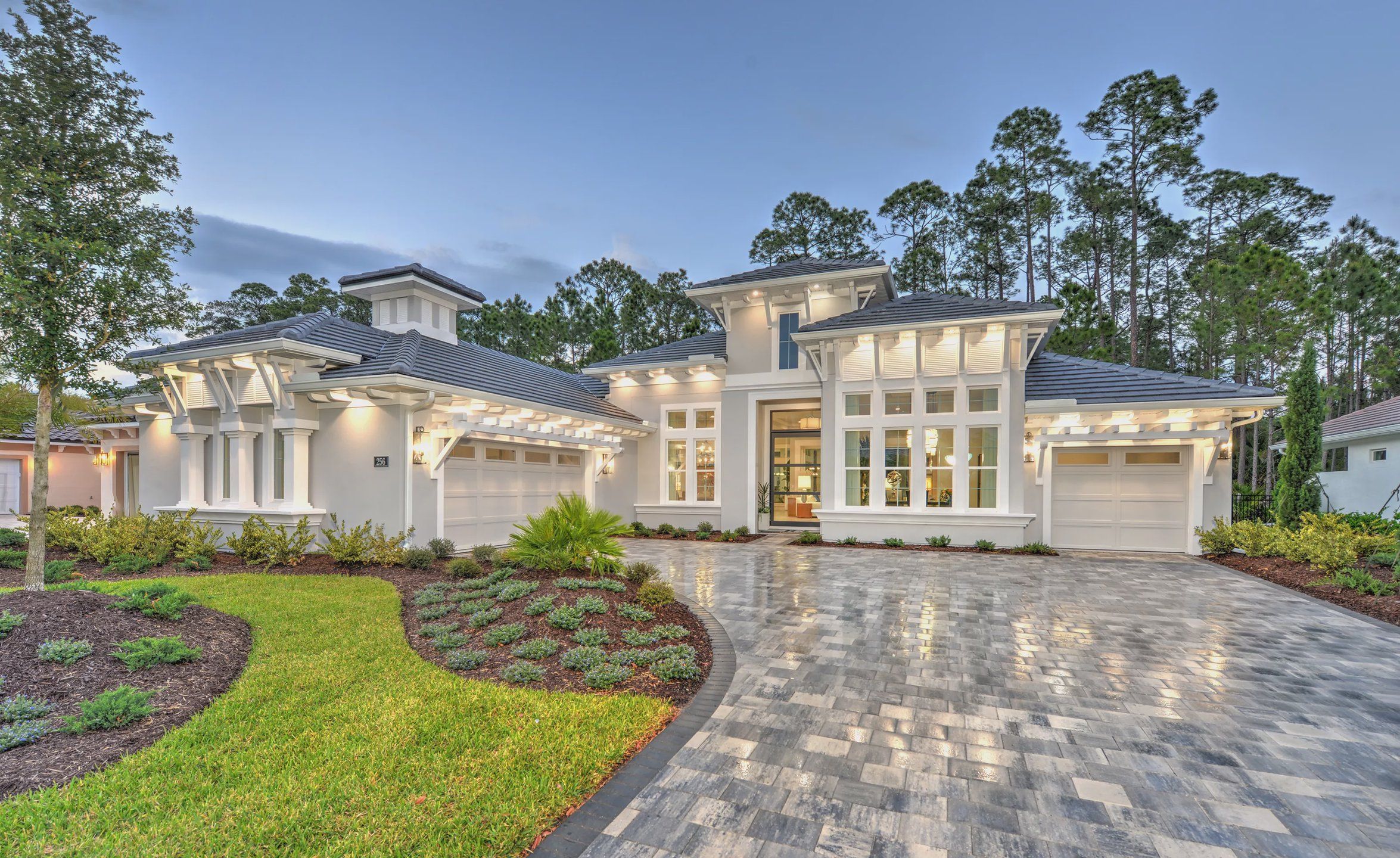 Front exterior of a home in the Westlake Executive community, located in Ormond Beach, FL (Image 1).