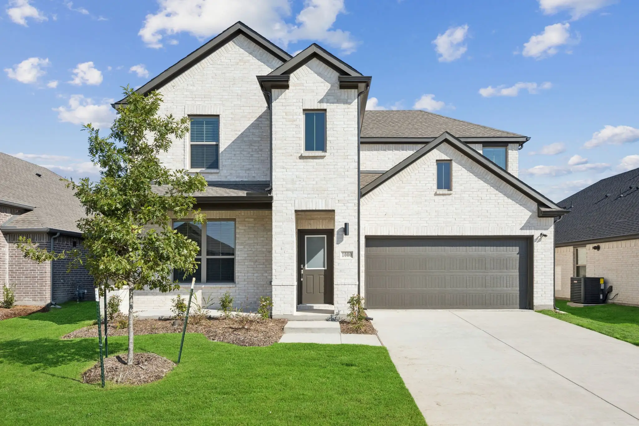 Front exterior of a home in the Rocky Creek Crossing community, located in Crowley, TX (Image 1). Front exterior of a home in the Rocky Creek Crossing community, located in Crowley, TX (Image 1).
