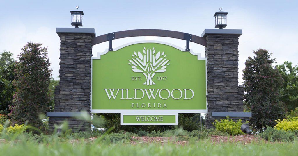 Entrance to the Tillman Oaks community in Wildwood, FL, featuring signage and landscaping (Image 1). Entrance to the Tillman Oaks community in Wildwood, FL, featuring signage and landscaping (Image 1).