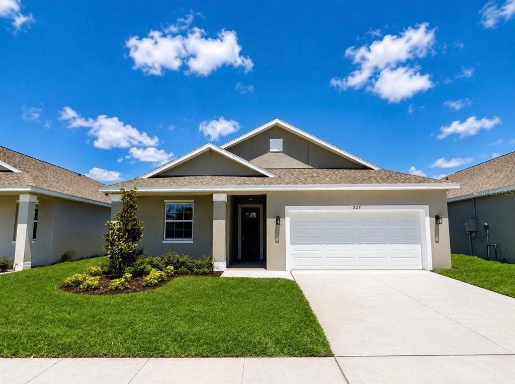 Front exterior of a new home in , Apopka, FL, highlighting curb appeal (Image 1). Front exterior of a new home in , Apopka, FL, highlighting curb appeal (Image 1).