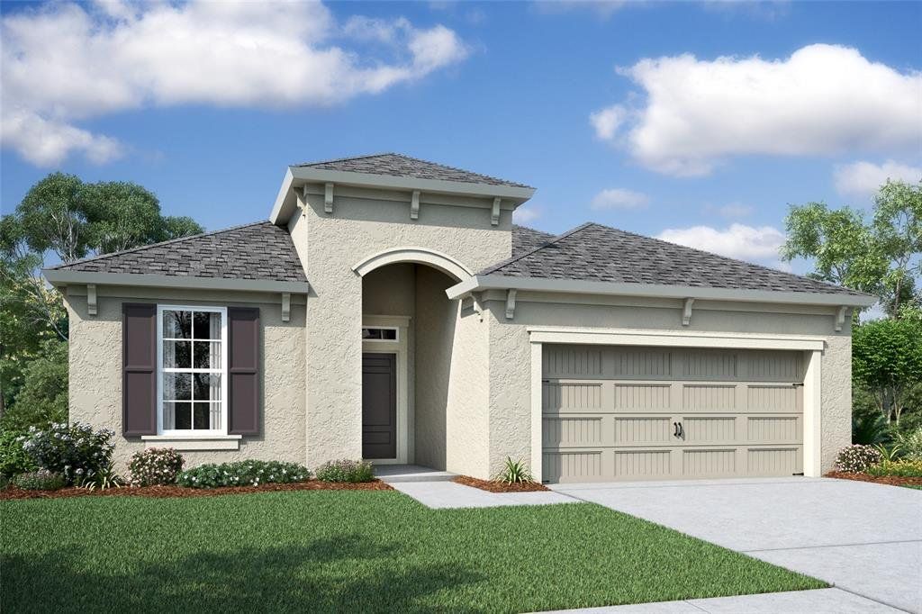 Front exterior of a new home in Cascades at Southern Hills, Brooksville, FL, highlighting curb appeal (Image 1). Front exterior of a new home in Cascades at Southern Hills, Brooksville, FL, highlighting curb appeal (Image 1).