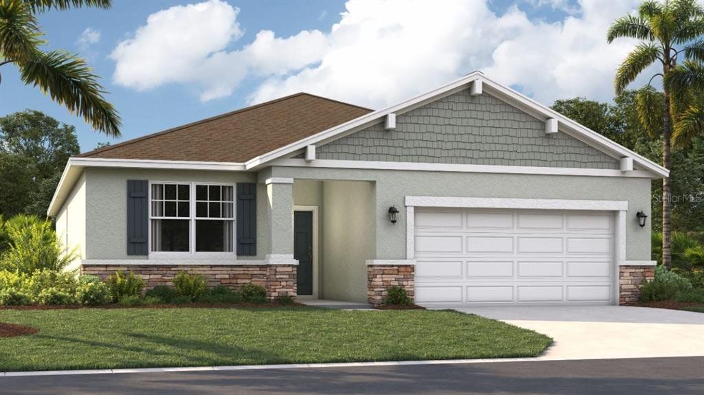 Front exterior of a new home in Village at Windsor Reserve, Eagle Lake, FL, highlighting curb appeal (Image 1).