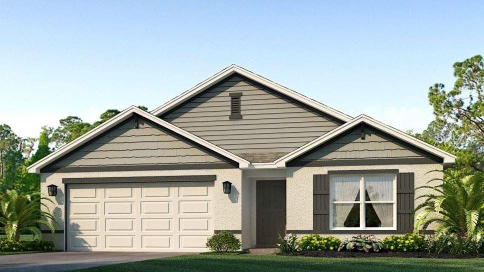 Front exterior of a new home in Mandarin Grove, Palmetto, FL, highlighting curb appeal (Image 1). Front exterior of a new home in Mandarin Grove, Palmetto, FL, highlighting curb appeal (Image 1).