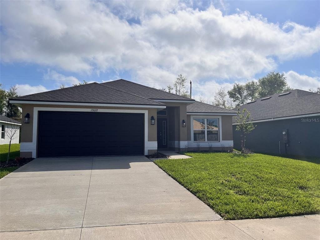 Front exterior of a new home in Abbey Glen, Dade City, FL, highlighting curb appeal (Image 1). Front exterior of a new home in Abbey Glen, Dade City, FL, highlighting curb appeal (Image 1).