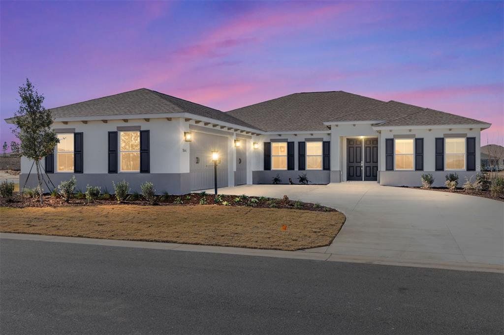 Front exterior of a new home in , Ocala, FL, highlighting curb appeal (Image 1). Front exterior of a new home in , Ocala, FL, highlighting curb appeal (Image 1).