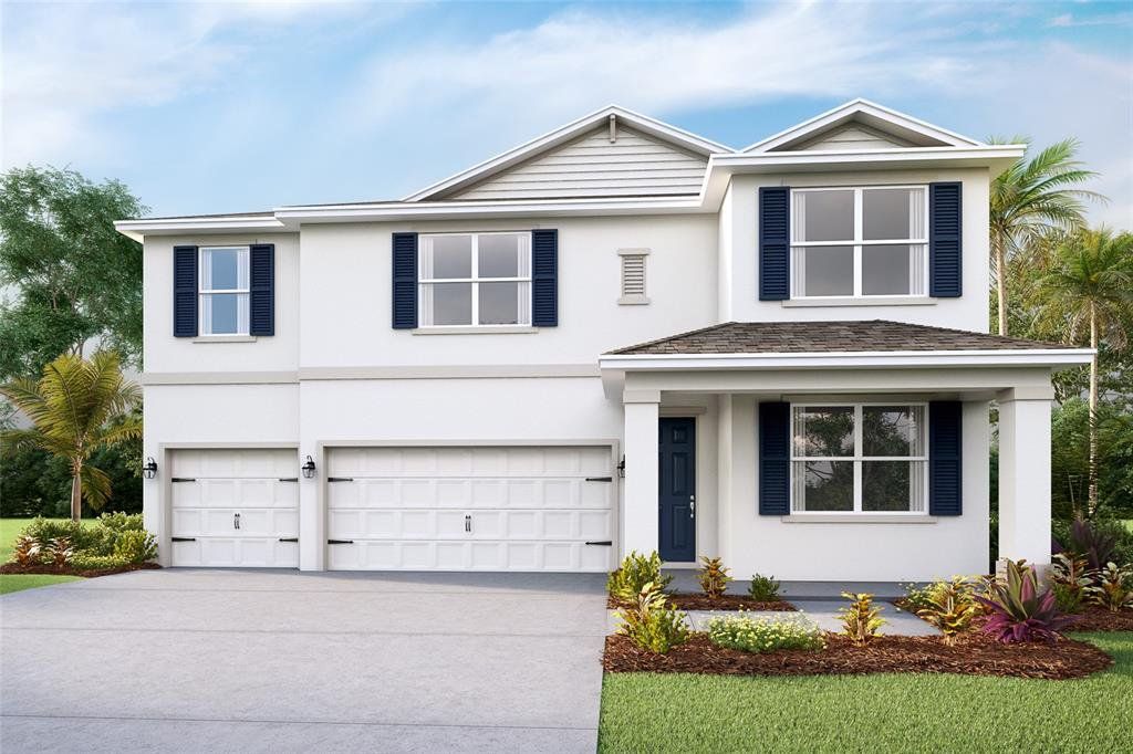 Front exterior of a new home in Hammock at Two Rivers, Zephyrhills, FL, highlighting curb appeal (Image 1). Front exterior of a new home in Hammock at Two Rivers, Zephyrhills, FL, highlighting curb appeal (Image 1).