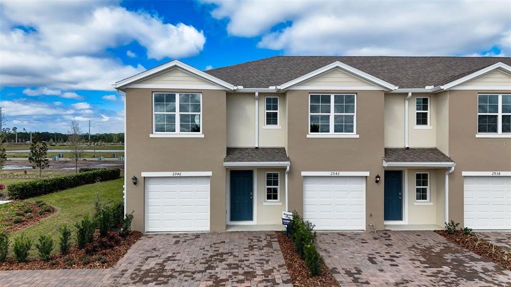 Front exterior of a new home in , St. Cloud, FL, highlighting curb appeal (Image 1). Front exterior of a new home in , St. Cloud, FL, highlighting curb appeal (Image 1).