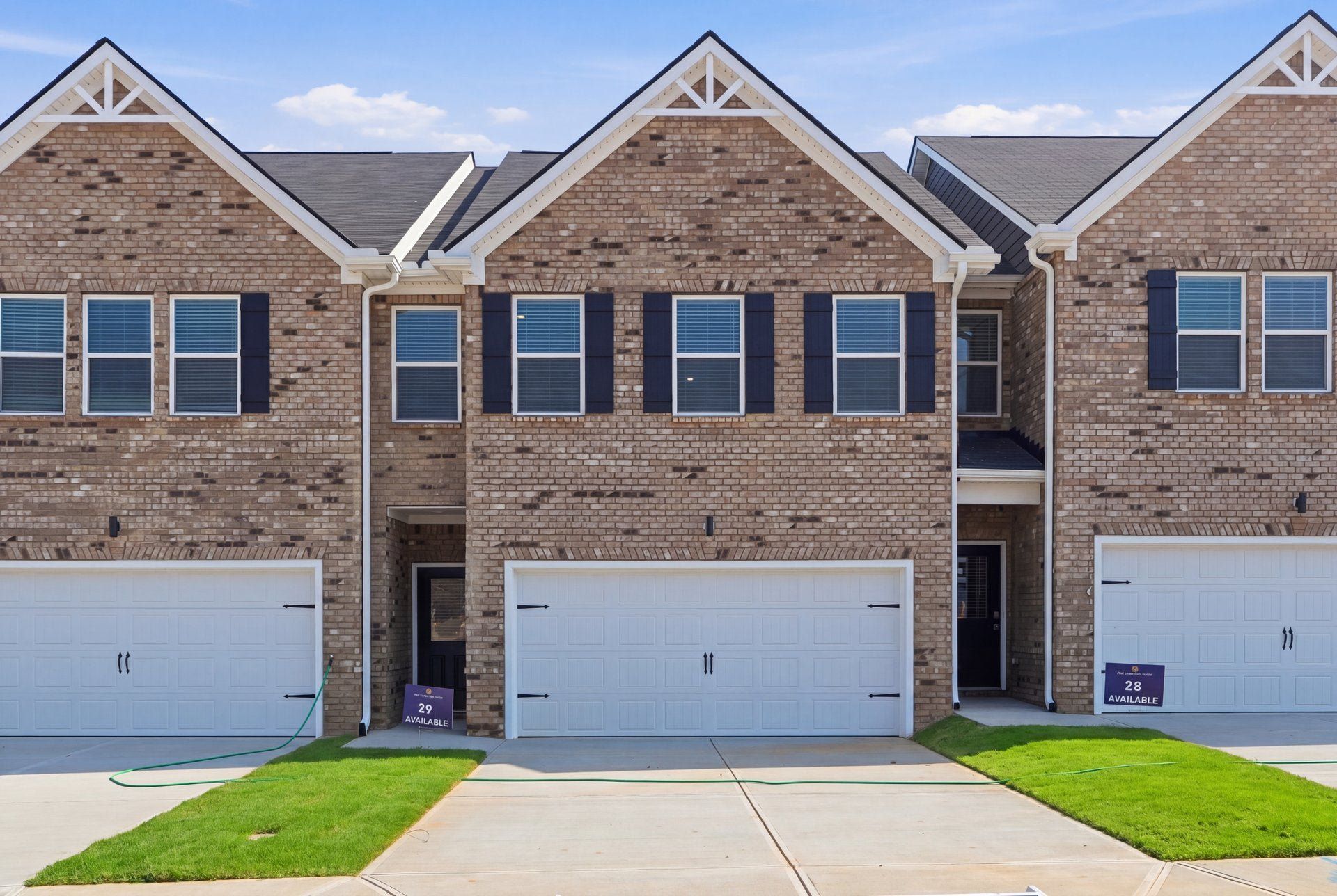 Front exterior of a new home in Parkway James, Snellville, GA, highlighting curb appeal (Image 1). Front exterior of a new home in Parkway James, Snellville, GA, highlighting curb appeal (Image 1).