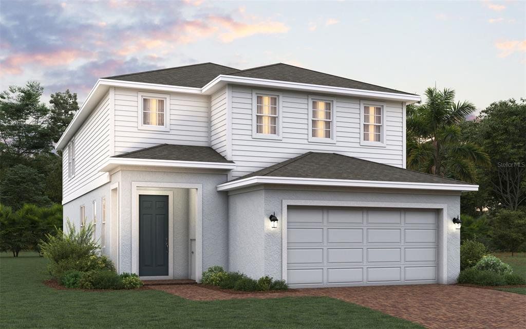 Front exterior of a new home in Trinity Lakes, Groveland, FL, highlighting curb appeal (Image 1). Front exterior of a new home in Trinity Lakes, Groveland, FL, highlighting curb appeal (Image 1).