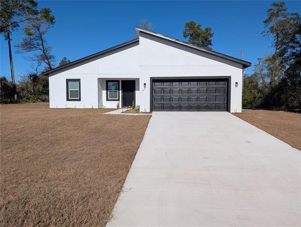 Front exterior of a new home in , Ocala, FL, highlighting curb appeal (Image 1). Front exterior of a new home in , Ocala, FL, highlighting curb appeal (Image 1).