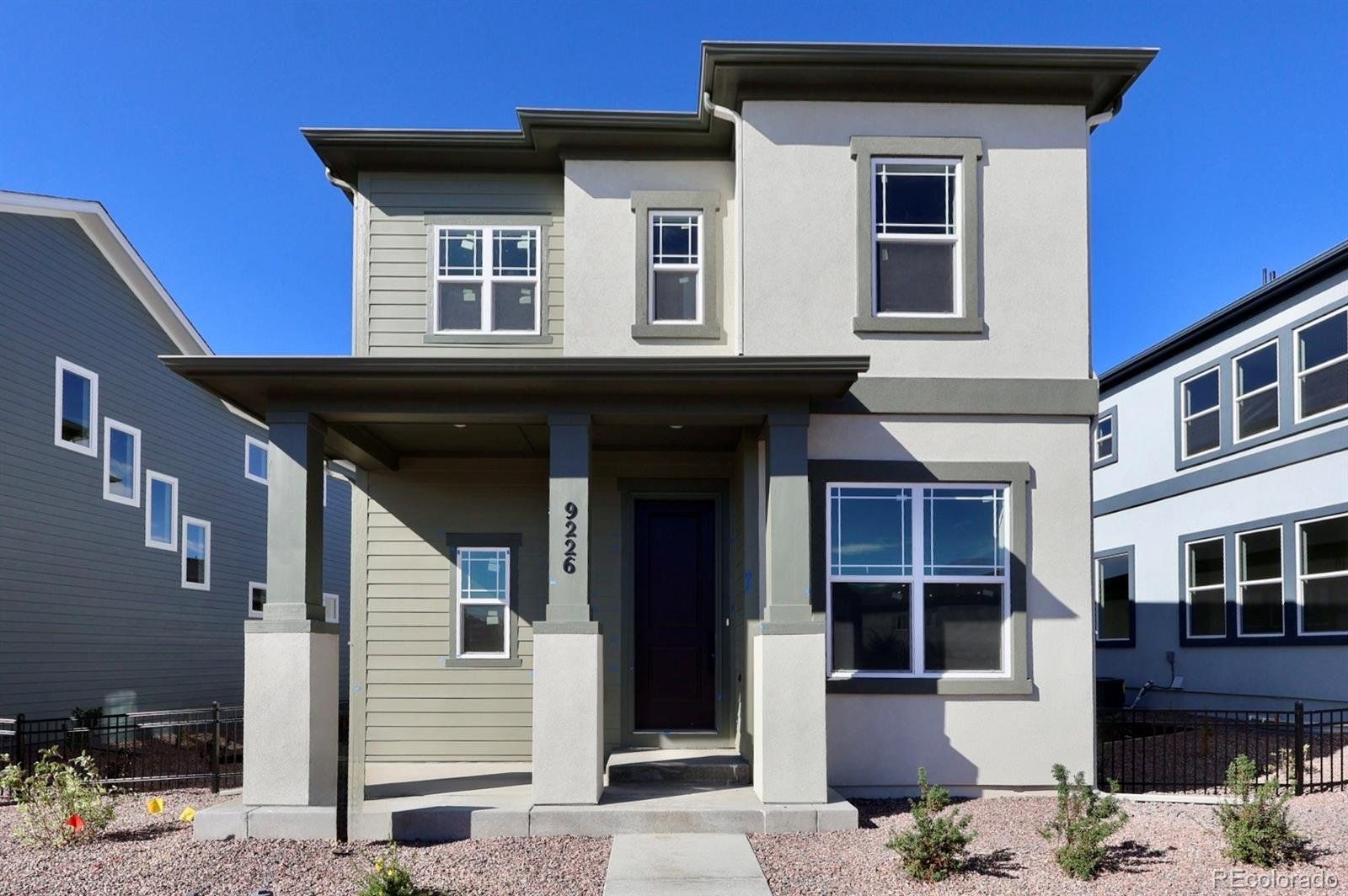 Exterior details and patio area of a home in Revel Crossing at Wolf Ranch – The Outlook Collection, Colorado Springs (Image 1). Exterior details and patio area of a home in Revel Crossing at Wolf Ranch – The Outlook Collection, Colorado Springs (Image 1).