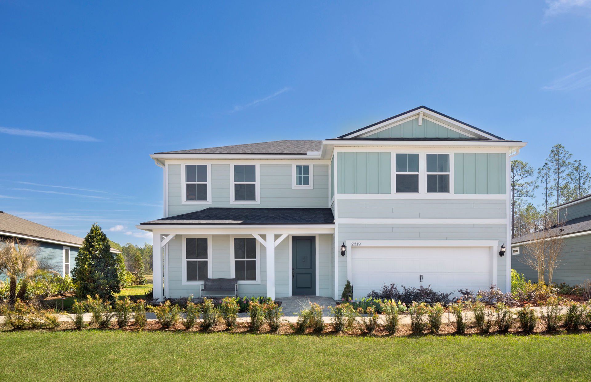 Front exterior of a new home in Double Branch, Middleburg, FL, highlighting curb appeal (Image 1). Front exterior of a new home in Double Branch, Middleburg, FL, highlighting curb appeal (Image 1).