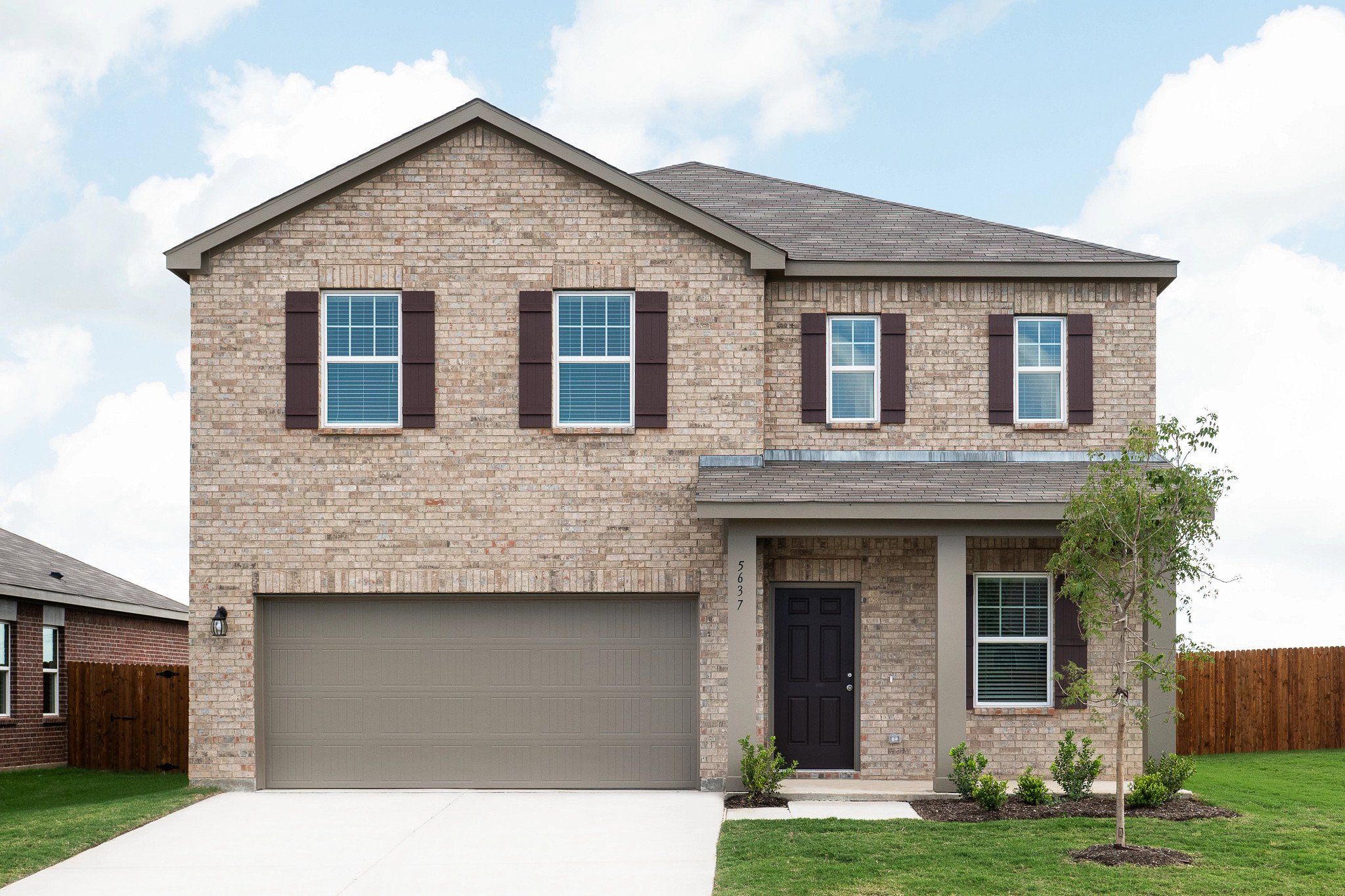 Front exterior of a new home in Hennersby Hollow, San Antonio, TX, highlighting curb appeal (Image 1). Front exterior of a new home in Hennersby Hollow, San Antonio, TX, highlighting curb appeal (Image 1).