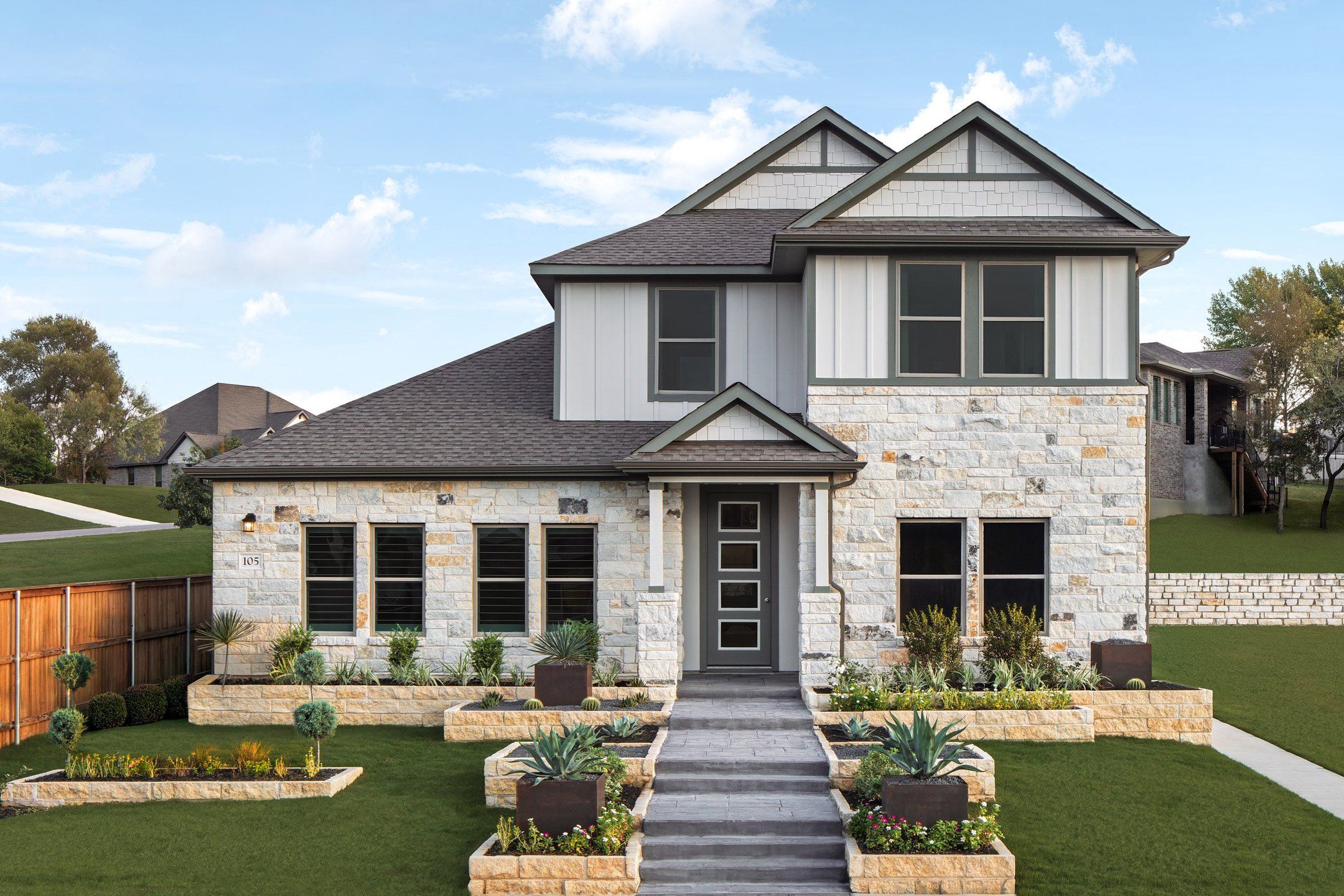 Front exterior of a new home in Heartland, Heartland, TX, highlighting curb appeal (Image 1). Front exterior of a new home in Heartland, Heartland, TX, highlighting curb appeal (Image 1).