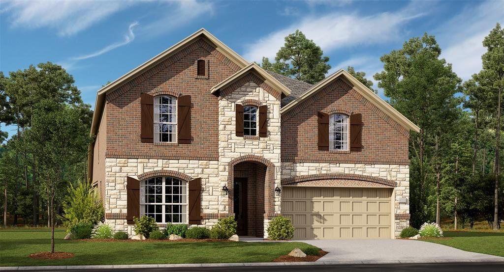 French country inspired facade featuring stone siding, brick siding, a front yard, an attached garage, and concrete driveway French country inspired facade featuring stone siding, brick siding, a front yard, an attached garage, and concrete driveway