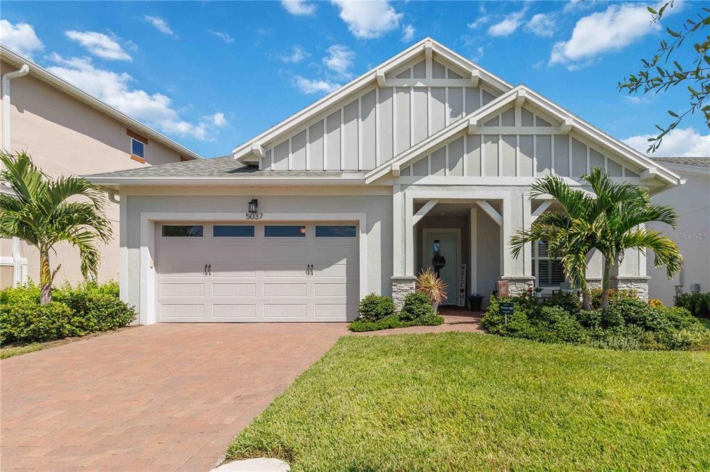 Front exterior of a new home in , St. Cloud, FL, highlighting curb appeal (Image 1). Front exterior of a new home in , St. Cloud, FL, highlighting curb appeal (Image 1).