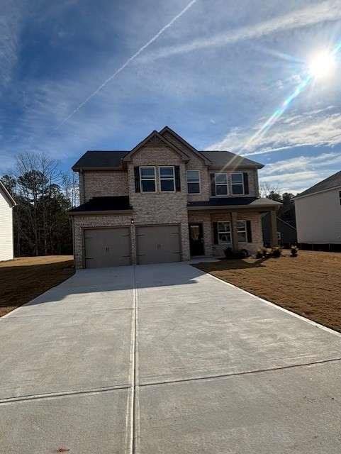 Front exterior of a new home in , Fairburn, GA, highlighting curb appeal (Image 1). Front exterior of a new home in , Fairburn, GA, highlighting curb appeal (Image 1).