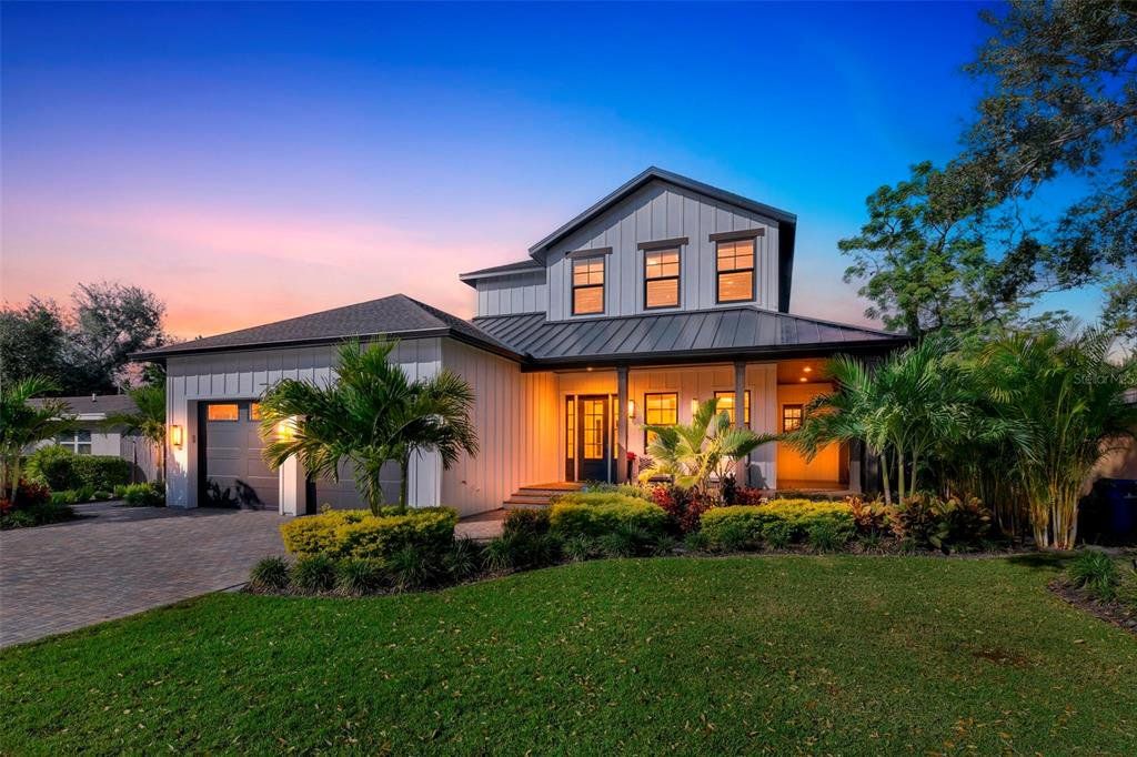Front exterior of a new home in , Sarasota, FL, highlighting curb appeal (Image 1). Front exterior of a new home in , Sarasota, FL, highlighting curb appeal (Image 1).