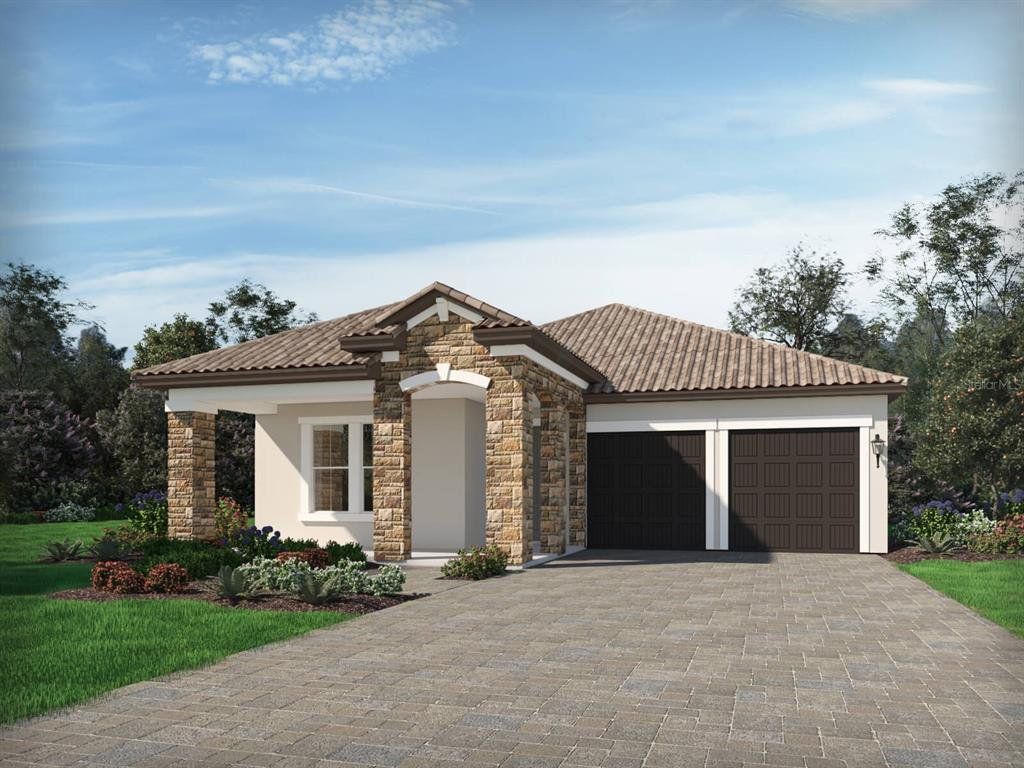 Front exterior of a new home in Silverleaf Reserve, Winter Garden, FL, highlighting curb appeal (Image 1). Front exterior of a new home in Silverleaf Reserve, Winter Garden, FL, highlighting curb appeal (Image 1).