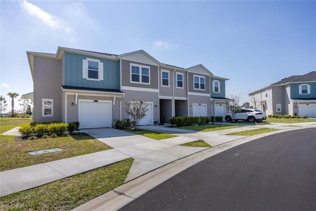 Front exterior of a new home in , Ocala, FL, highlighting curb appeal (Image 1). Front exterior of a new home in , Ocala, FL, highlighting curb appeal (Image 1).