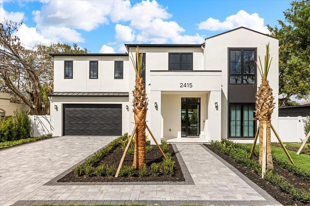 Front exterior of a new home in , Orlando, FL, highlighting curb appeal (Image 1). Front exterior of a new home in , Orlando, FL, highlighting curb appeal (Image 1).