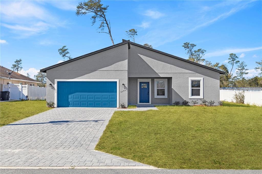 Front exterior of a new home in , Ocala, FL, highlighting curb appeal (Image 1). Front exterior of a new home in , Ocala, FL, highlighting curb appeal (Image 1).