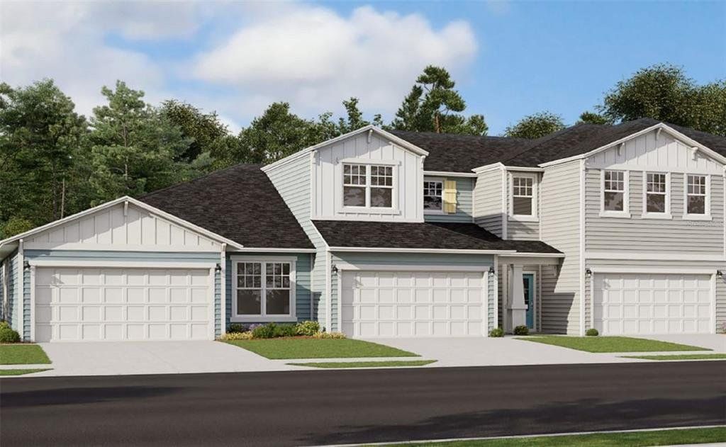 Front exterior of a new home in Seaire, Parrish, FL, highlighting curb appeal (Image 1). Front exterior of a new home in Seaire, Parrish, FL, highlighting curb appeal (Image 1).
