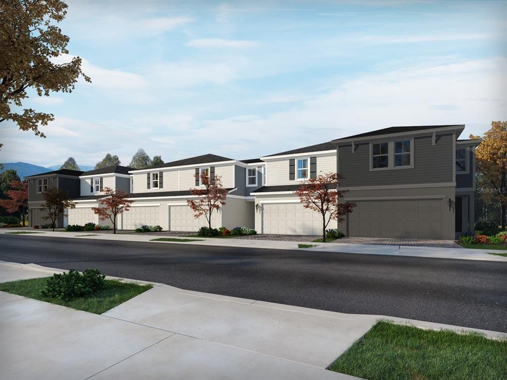 Front exterior of a new home in Bradford Park, Ormond Beach, FL, highlighting curb appeal (Image 1). Front exterior of a new home in Bradford Park, Ormond Beach, FL, highlighting curb appeal (Image 1).