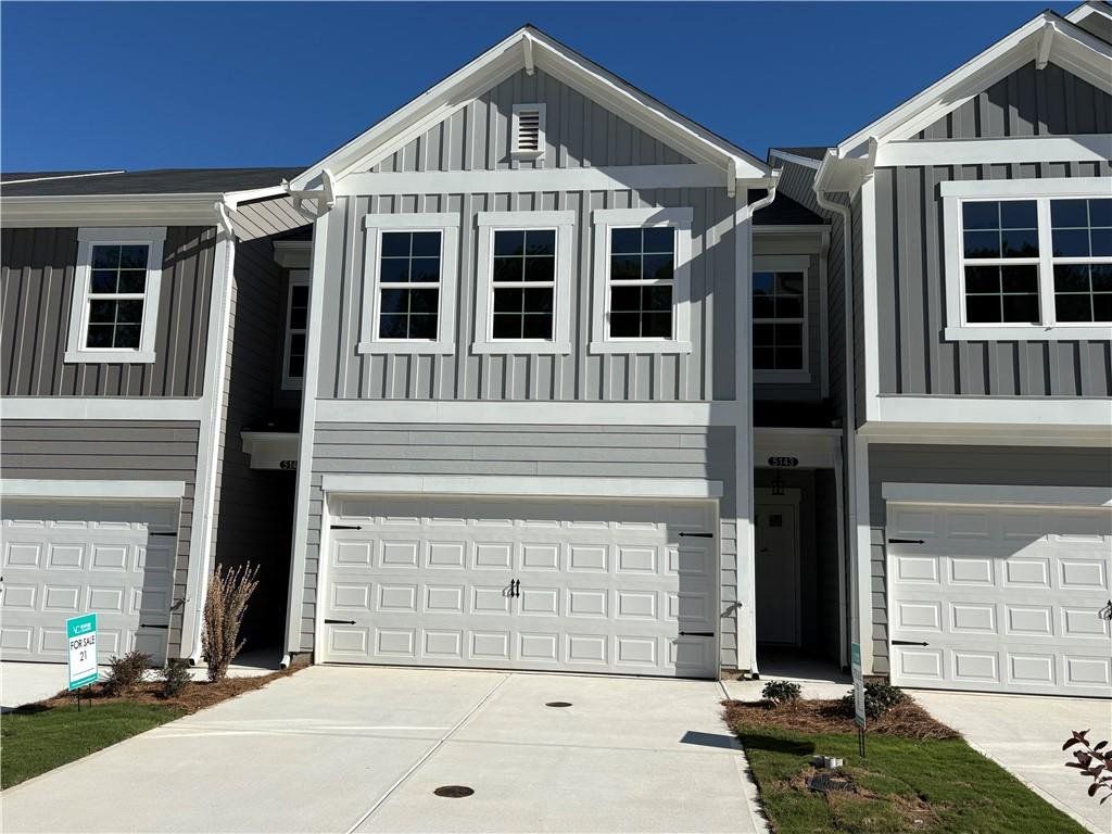 Front exterior of a new home in Longview Run, Decatur, GA, highlighting curb appeal (Image 1). Front exterior of a new home in Longview Run, Decatur, GA, highlighting curb appeal (Image 1).