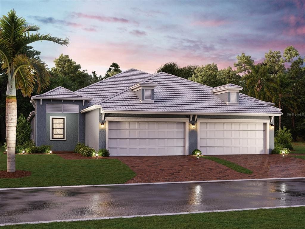 Front exterior of a new home in Sweetwater at Lakewood Ranch, Lakewood Ranch, FL, highlighting curb appeal (Image 1). Front exterior of a new home in Sweetwater at Lakewood Ranch, Lakewood Ranch, FL, highlighting curb appeal (Image 1).