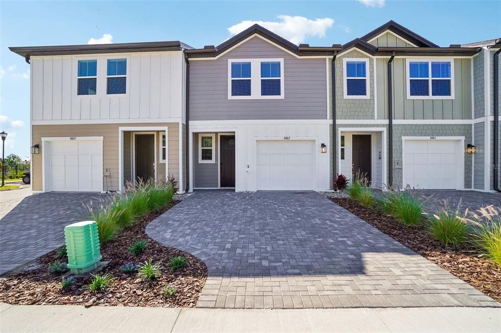 Front exterior of a new home in Montague Chase, Tampa, FL, highlighting curb appeal (Image 1). Front exterior of a new home in Montague Chase, Tampa, FL, highlighting curb appeal (Image 1).