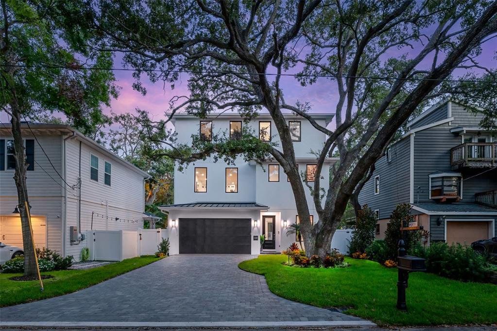 Front exterior of a new home in , Tampa, FL, highlighting curb appeal (Image 1). Front exterior of a new home in , Tampa, FL, highlighting curb appeal (Image 1).