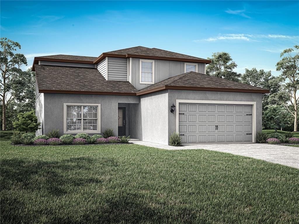 Front exterior of a new home in Tula Parc, Astatula, FL, highlighting curb appeal (Image 1). Front exterior of a new home in Tula Parc, Astatula, FL, highlighting curb appeal (Image 1).