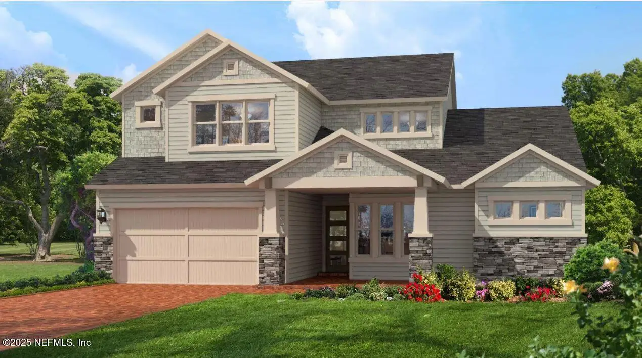 Front exterior of a new home in Amelia National, Jacksonville, FL, highlighting curb appeal (Image 1). Front exterior of a new home in Amelia National, Jacksonville, FL, highlighting curb appeal (Image 1).