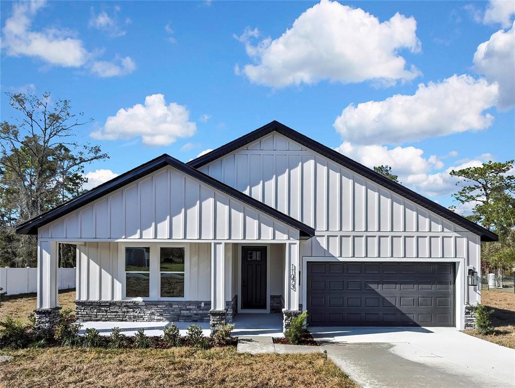 Front exterior of a new home in , Weeki Wachee, FL, highlighting curb appeal (Image 1). Front exterior of a new home in , Weeki Wachee, FL, highlighting curb appeal (Image 1).