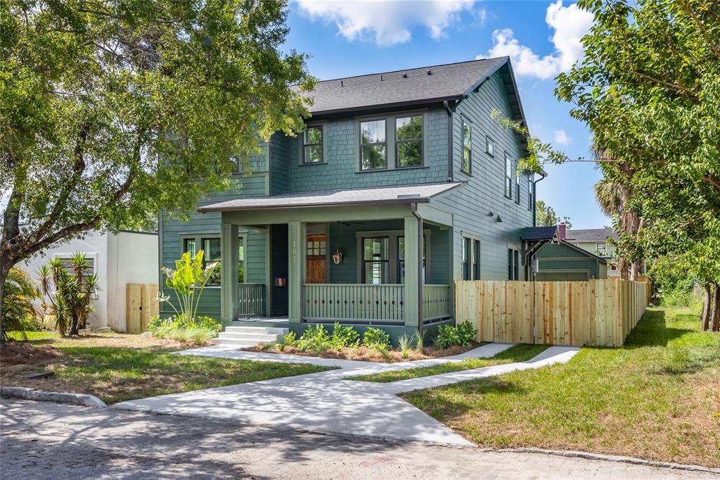 Front exterior of a new home in , Tampa, FL, highlighting curb appeal (Image 1).