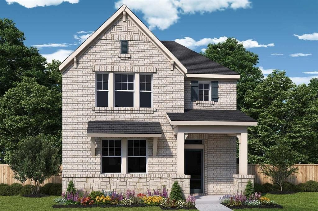 View of front of home featuring brick siding and stone siding View of front of home featuring brick siding and stone siding