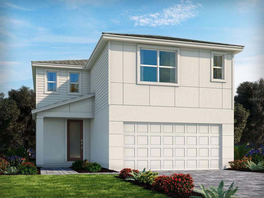 Front exterior of a new home in Crosswinds - Classic Series, Haines City, FL, highlighting curb appeal (Image 1). Front exterior of a new home in Crosswinds - Classic Series, Haines City, FL, highlighting curb appeal (Image 1).