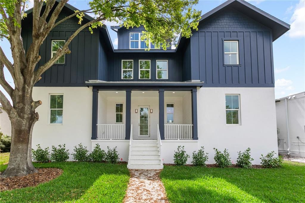 Front exterior of a new home in , St. Petersburg, FL, highlighting curb appeal (Image 1). Front exterior of a new home in , St. Petersburg, FL, highlighting curb appeal (Image 1).