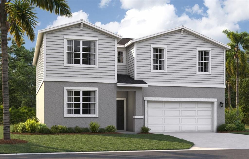 Front exterior of a new home in Silver Lake Pointe, Leesburg, FL, highlighting curb appeal (Image 1). Front exterior of a new home in Silver Lake Pointe, Leesburg, FL, highlighting curb appeal (Image 1).