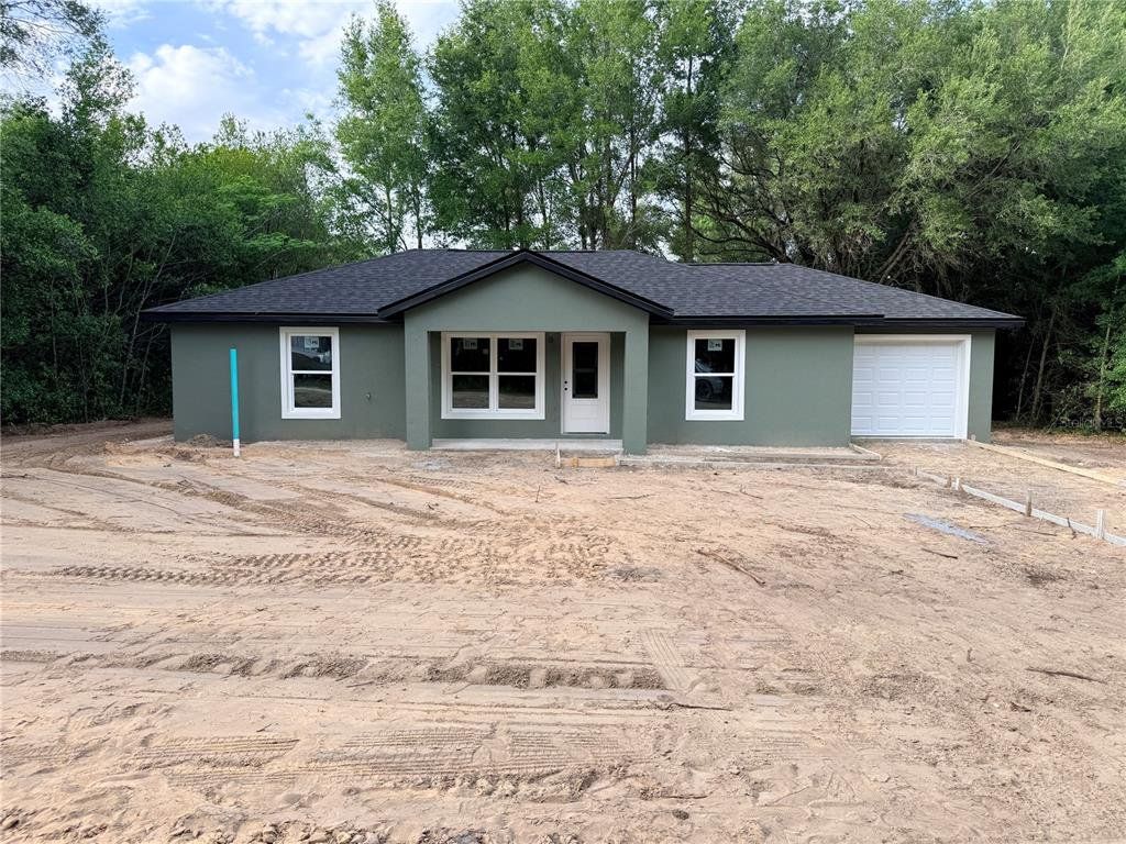 Exterior details and patio area of a home in , Summerfield (Image 1). Exterior details and patio area of a home in , Summerfield (Image 1).