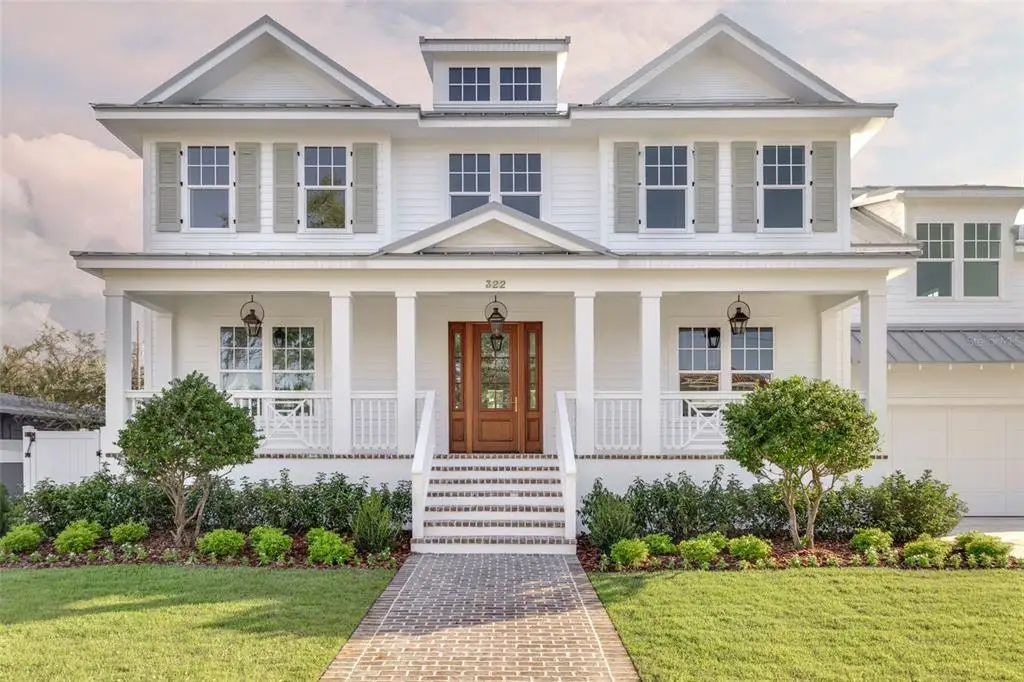 Front exterior of a new home in , St. Petersburg, FL, highlighting curb appeal (Image 1).
