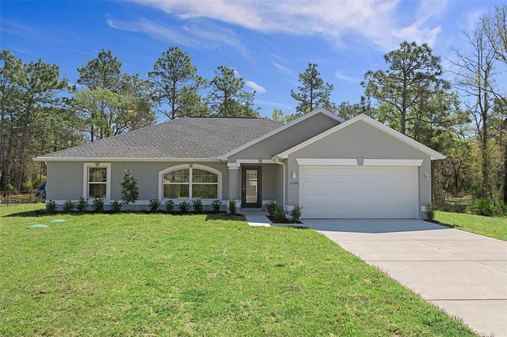 Front exterior of a new home in , Brooksville, FL, highlighting curb appeal (Image 1). Front exterior of a new home in , Brooksville, FL, highlighting curb appeal (Image 1).